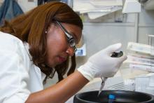 Photo of a researcher working in a lab